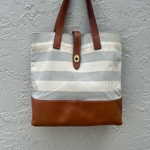 Fossil striped canvas tote bag with brown leather trim and a Brass Turn- Lock